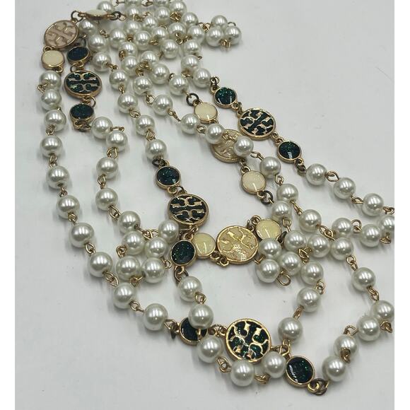 Tory Burch Authentic Long
Pearl Logo Medallion
Multi-Strand Gold 60" Necklace - Picture 6 of 15